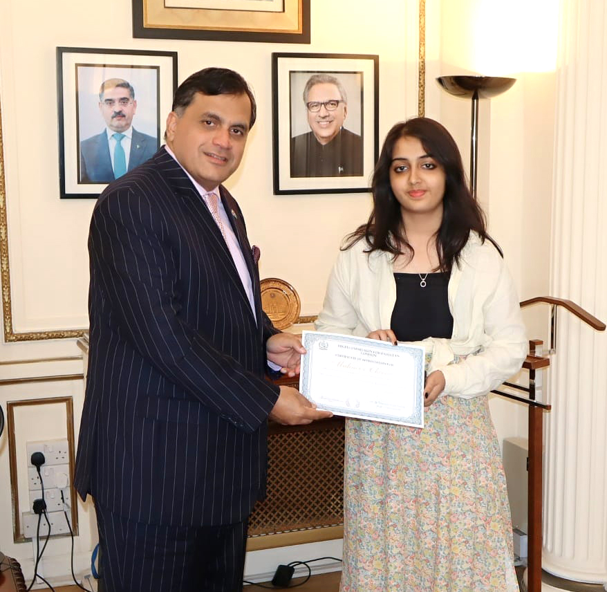 LONDON: High Commissioner Dr. Mohammad Faisal awarding a ‘Certificate of Appreciation’ to the outstanding British Pakistani student, Mahnoor Cheema.